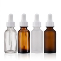 Vente en gros de flacons compte-gouttes en verre Boston peints de 60 ml, flacons en verre vides avec bouchon compte-gouttes noir pour huile essentielle