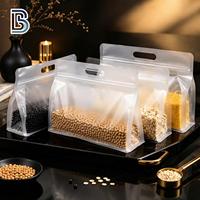 Sac à fond plat à huit soudures latérales Lebei avec poignée et fermeture éclair, sac transparent pour aliments secs et fruits, fourni par l'usine