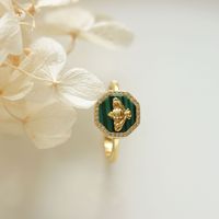 Style japonais S925 argent plaqué or Malachite petite abeille ouverte pour les femmes à la mode Niche Design Vintage Palace Tail Anniversary