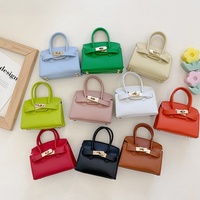 Sac à main mini tendance pour enfants en cuir PU, petit sac bandoulière avec sangle réglable, sac à bandoulière mignon pour femmes avec décoration étoile