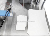 Machine à riveter à double œillet UT150EL pour étiquettes suspendues |   Machine automatique de perforation et d'œillets pour le carton