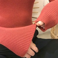 En stock vente en gros de hauts tricotés pull d'hiver à col roulé couleur unie pull Slim Fit pour femmes pull en tricot à manches longues
