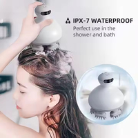Masseur de tête électrique portable avec cinq têtes de massage en ABS+silicone pour le cuir chevelu et le visage, favorisant la croissance des cheveux