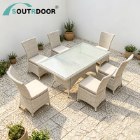 Ensemble table et chaises empilables modernes, durables, économiques, en aluminium et rotin, imperméables, pour hôtel et école, mobilier de salle à manger extérieure