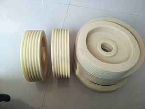 Изготовленные на заказ OEM-ролики из нейлона с H-образным пазом, блок-шкив с 3 пазами и диаметром отверстия 100 мм - Product Image 1