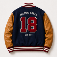 Blouson universitaire oversize avec logo brodé en chenille découpé au laser, coupe ample, manches en cuir, corps en laine, style Letterman