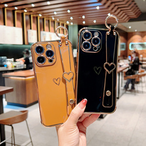 Nueva funda de teléfono chapada en forma de corazón vacía con correa de muñeca de lujo a la moda para <span class=keywords><strong>iPhone</strong></span> 15 16 14 13 12 <span class=keywords><strong>11</strong></span> 17 Pro Max Plus - Product Image 3