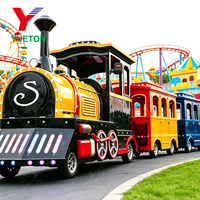 Train touristique électrique sans rails à cabine fermée, prêt pour la pluie, avec LED arc-en-ciel, pour une exploitation en parcs toute l'année
