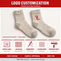 Chaussettes de sport chaudes en laine mérinos pour homme, design hiver, avec logo, pour entraînements, fabriquées par Xingyou Knitting Manufacturer, chaussettes personnalisées pour hommes.