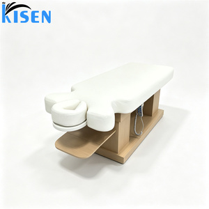 Le lit de massage électrique de style thaïlandais Kisen est doté d'un cuir de qualité supérieure et d'une base en bois réglable, adapté aux massages du visage et du corps. - Product Image 2