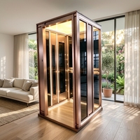 Cabine panoramique ronde personnalisée en acier inoxydable avec porte vitrée, panneau mural en marbre et éclairage LED au plafond pour ascenseur
