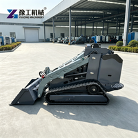 Skid Steer Loader Dengan Bucket dan Garpu untuk Operasi Pemuatan dan Pembongkaran Gudang