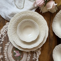 Service de vaisselle en céramique vintage européenne personnalisée, jaune émaillé avec décor français, assiette à salade et bol de luxe en relief