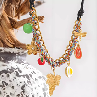Tendance noir Pu corde bijoux faits à la main tressé fleur breloques raisin et pomme coloré corde tissé fruits pendentif collier