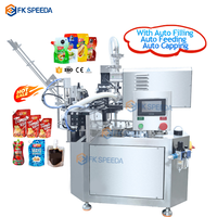 Machine de remplissage scellage de sachets à bec pour liquide visqueux automatique de bureau machine de remplissage de sachets à bec verseur pour jus
