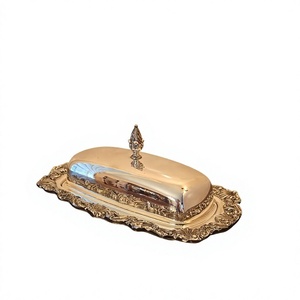 Beurrier ovale en argent avec couvercle, design vintage, en métal poli, vaisselle décorative pour cuisine et fêtes - Product Image 1