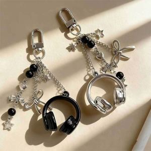 Llavero de plástico moderno con mini auriculares, lazo, estrella, corazón, cuentas y borlas, impermeable, colgante para bolso, estilo Y2K, regalo de streetwear, recuerdo personalizado - Product Image 1