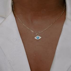 Collier pendentif Gemnel en laiton plaqué or 18 carats et rhodium, avec zircone cubique et saphir bleu porte-bonheur, motif œil protecteur, pour femme - Product Image 2