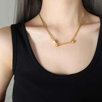 Ensemble collier et bracelet en acier titane plaqué or 18 carats avec pendentif balle d'équilibre irrégulière et clé