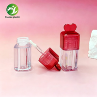 Tube de brillant à lèvres vide en plastique transparent en forme de cœur, personnalisable pour l'emballage cosmétique – Vente en gros