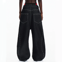 Jeans en denim brut lourd avec rivets en forme d'aile d'avion, style streetwear