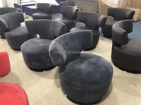 Vente chaude chaise de canapé pivotante à dossier rond fauteuil en cuir unique de loisirs de luxe chaises de café à dossier en aluminium de haut niveau