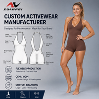 Combinaison de yoga marron 1 pièce pour femme, col halter, dos ouvert, short moulant froncé aux fesses, logo personnalisé OEM ODM, tenue de sport et fitness