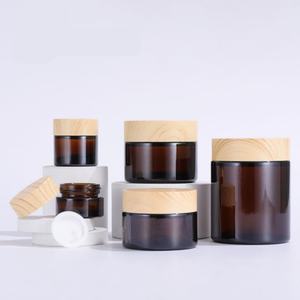 Hot Sale 5g 10g 15g 20g 30g 50g 100g Facial Care Cosmetic Packaging Amber Brown Cosmetic Glass Cream Jar with Dark <b>Wood</b> Lid - Product Image 6