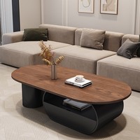 Table basse ovale rétro de style mid-century avec structure en métal, plateau en verre, design moderne minimaliste, luxe décoratif, petite table pour salon