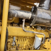 Niveleuse Caterpillar 140K d'occasion - Multifonctionnelle pour le nivellement Prix abordable avec 1 an de garantie
