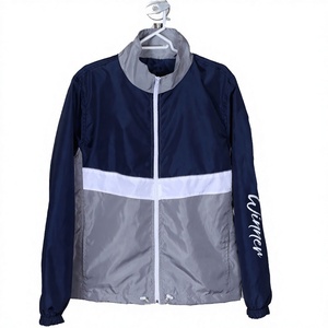 Veste de course coupe-vent pour homme de qualité supérieure, couleur gris marine, avec blocs de couleur, fermeture éclair intégrale et logo sur la manche gauche, style sportif, idéale pour le printemps - Product Image 1