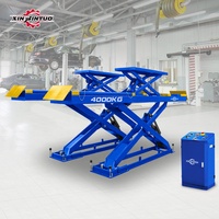 Xinjintuo Vente chaude Cric hydraulique automobile de type européen 8800lbs à double cylindre pour montage au sol et alignement