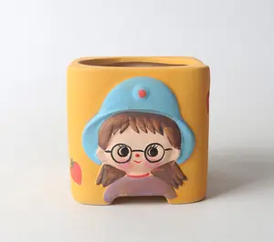 Maceta de cerámica con diseño de dibujos animados para plantas, maceta de cerámica verde pintada <span class=keywords><strong>a</strong></span> <span class=keywords><strong>mano</strong></span> con flores suculentas, 2023 - Product Image 1