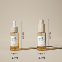 Flacon compte-gouttes transparent transparent PETG de qualité supérieure bouteille d'huile essentielle de soin des cheveux avec compte-gouttes en bambou et spray pour cosmétique