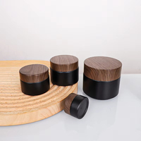 En Stock vente en gros 5/10/15/20/30/50g pots de crème pour le visage noir mat 1 2 4 Oz bocaux en verre avec couvercle en plastique grain de bois