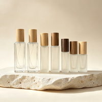 Flacon pulvérisateur cylindrique de luxe en verre dépoli transparent de 10 ml avec bouchon en bois, vente en gros
