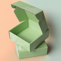 Boîte postale en papier ondulé vert imprimé avec logo personnalisé avec doublure en éponge T-shirt vide pour vêtements Sous-vêtements et boîtes cadeaux