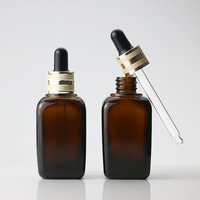 Flacon compte-gouttes carré en verre ambré personnalisé de 10 ml, 20 ml, 30 ml, 50 ml, 100 ml pour huiles essentielles et sérums de soin de la peau avec bouchon à vis