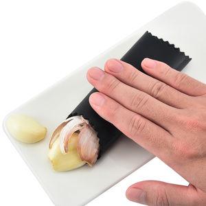 Utensilios de Cocina al por Mayor, Pelador de Ajo de Silicona de Grado Alimenticio, Pelador Manual Inteligente - Product Image 1