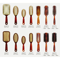 Peigne lissant en nylon finition écaille de tortue, brosse coussinée en plastique avec accents dorés pour tous types de cheveux