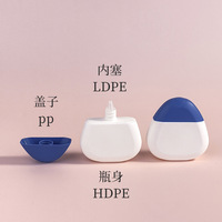 Nouvelle bouteille souple vide de 50 ml en PE, style galet triangulaire, imprimée, pour crème pour les mains, crème pour le visage et shampoing, modèle 2026