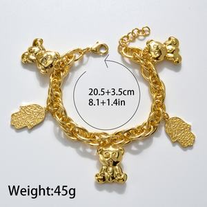 Nouveau bracelet à breloques en chaîne à maillons plaqué or 14 carats avec ours et Khamsah - Product Image 6