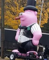 Modèle de cochon gonflable géant au prix d'usine, portant un gilet qui dit « greffe financière corporative » avec souffleur pour exposition
