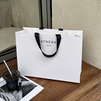 Sacs shopping en papier de luxe personnalisés avec poignées en ruban, logo imprimé pour les boutiques de vêtements et l'emballage de cadeaux