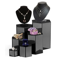 Vente en gros Présentoir hexagonal en acrylique Présentoir à bijoux en acrylique sur pied pour boutique de mariage