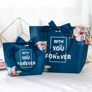 Faveur de mariage en papier <span class=keywords><strong>vert</strong></span> imprimé coloré personnalisé <span class=keywords><strong>sac</strong></span> à main bonbons transporter des sacs d'emballage petit mignon porte <span class=keywords><strong>sac</strong></span> cadeau avec ruban - Product Image 2