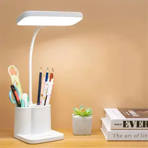 Produits les plus vendus 2023 charge USB lampe de bureau trois couleurs température gradation tactile apprentissage lampe de bureau avec boîte à stylos