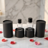 Flacon en verre transparent personnalisé OEM de haute qualité 30ml/50ml/100ml, avec pulvérisateur à pompe, pour soins capillaires, imprimé sérigraphié, dans un coffret cadeau cylindrique de luxe