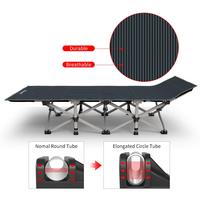 Lit pliant simple en gros, design peu encombrant, cadre métallique, durable pour bureau et camping, avec coussin