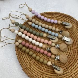 Chaîne de sucette en silicone Muslinlife avec support de tétine et clip anti-chute pour les enfants qui font leurs dents - Product Image 1